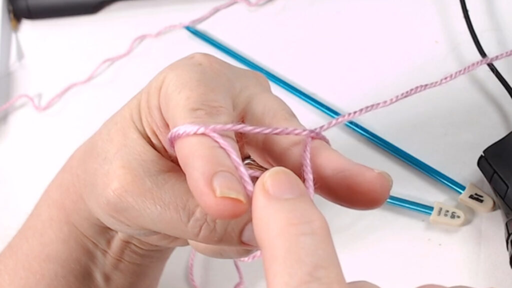 pulling yarn through loop