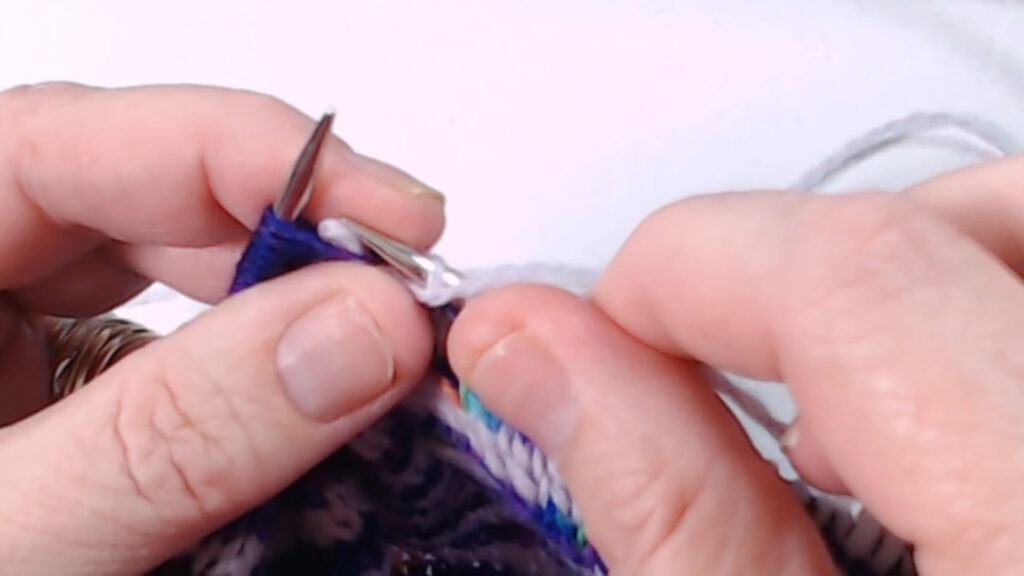 allowing stitch to drop off right needle