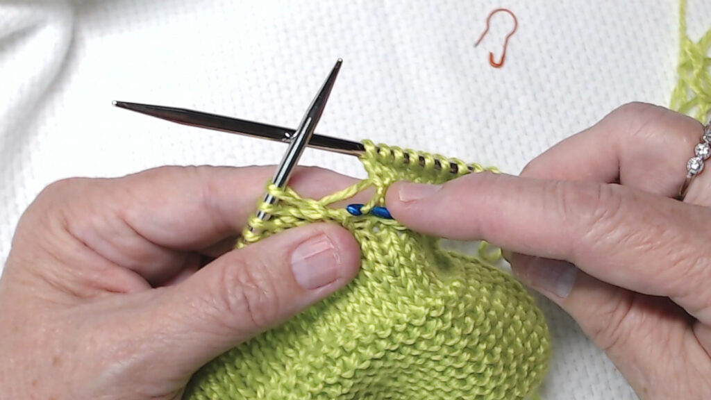crochet hook grabbing first bar