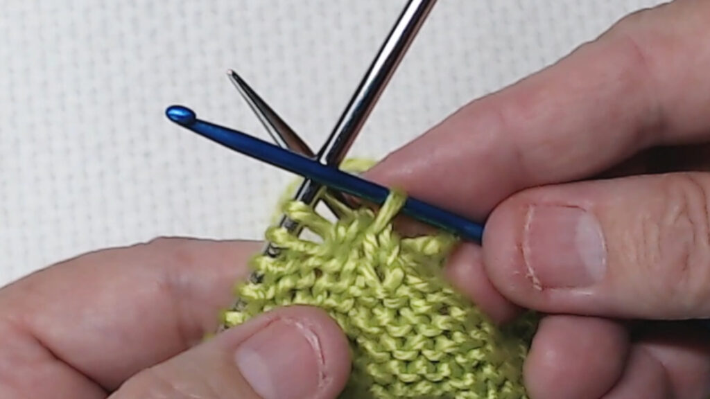 pulling yarn through loop